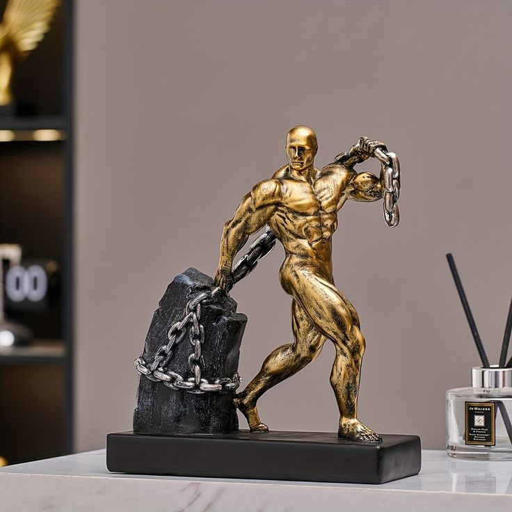 Golden Titan of Strength Sculpture